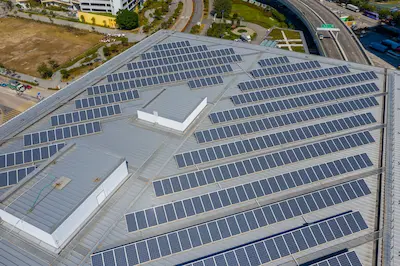Commercial solar panel installation on business building in Florida